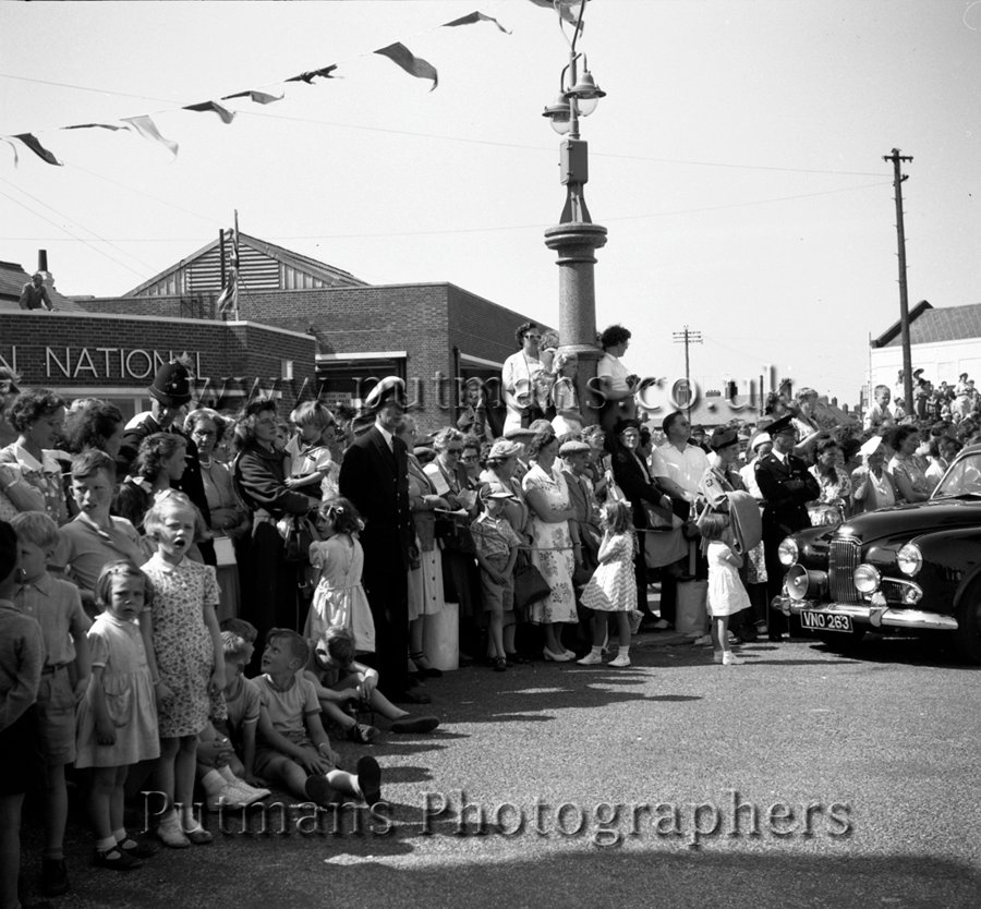 Ref 13 Customs Officer 'Brummy' Richardson keeps the crowd under control
