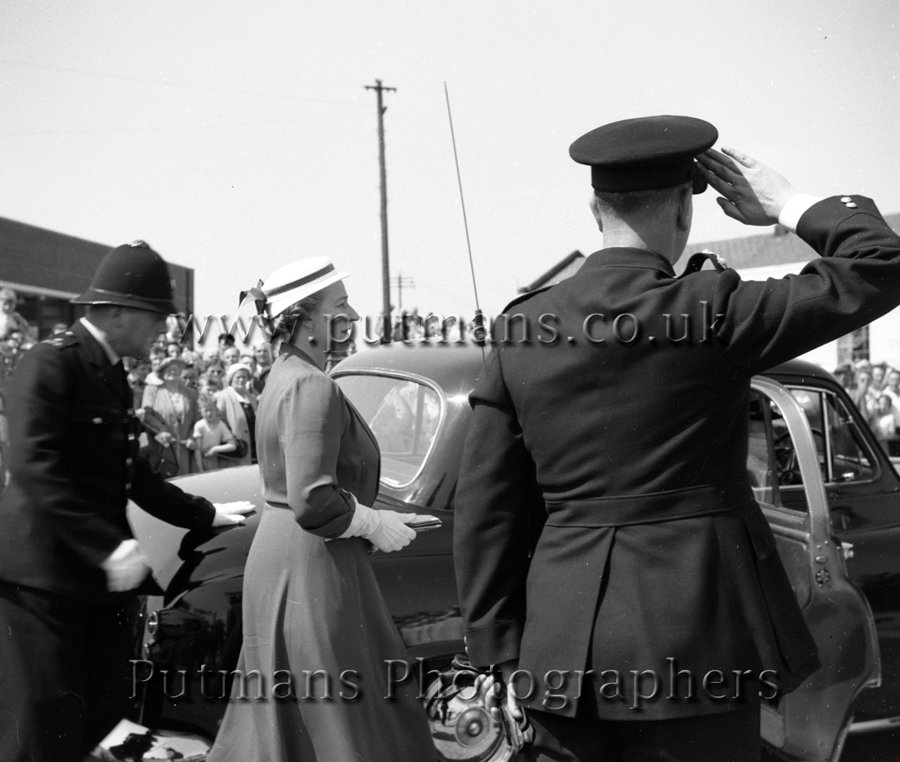 Ref 31 When the car with the Duchess does arrive a large policeman gets in the way