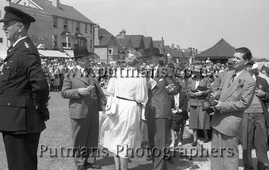 Ref 72 Photographer 'Paddy' Mullen armed with a plate camera also waits
