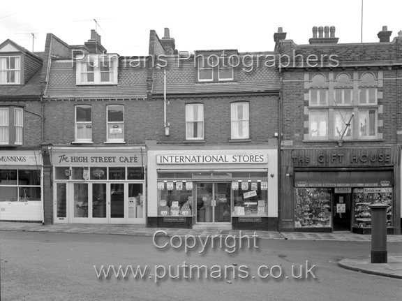 Ref 2703 International Stores, Munnings Fishmonger, High Street Café & The Gift House - November 1965