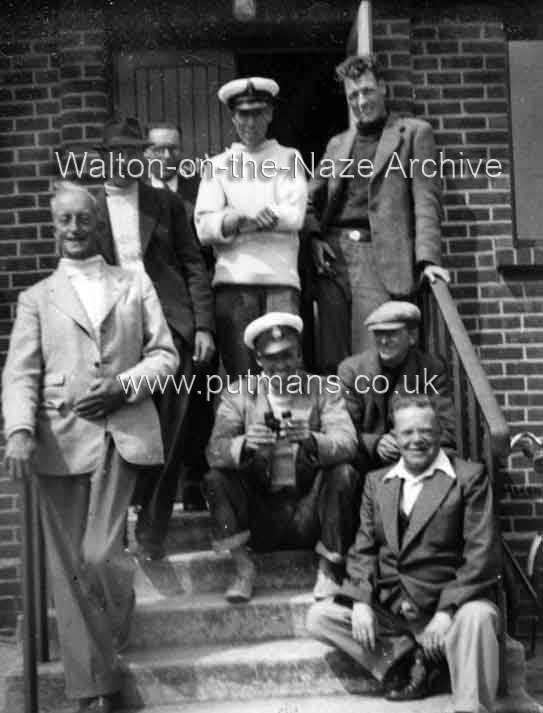 Ref 1835 Lifeboat men on boathouse steps c 1960