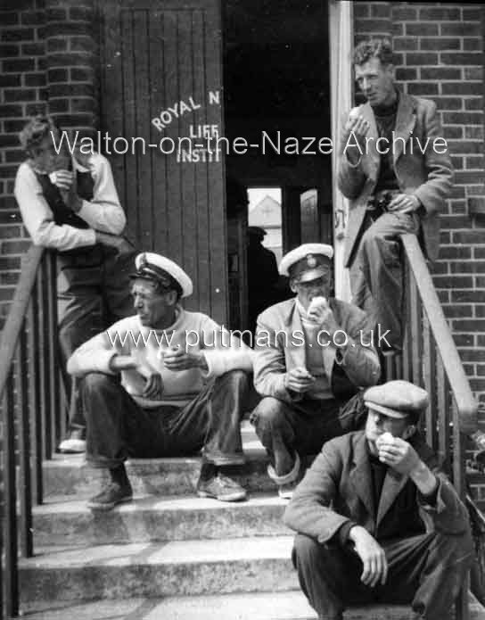 Ref 1836 Lifeboat men on boathouse steps c 1960