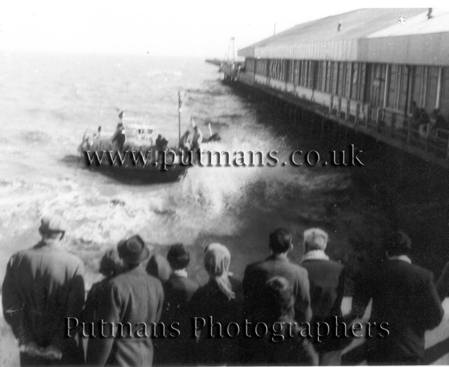Ref 719 Edian Courtauld recovering the body of a young girl from the sea. 5th April 1969