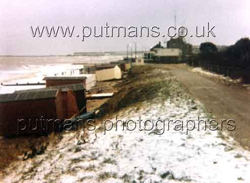 Ref 1605 ~Storm damaged beach huts 31st Dec 1979