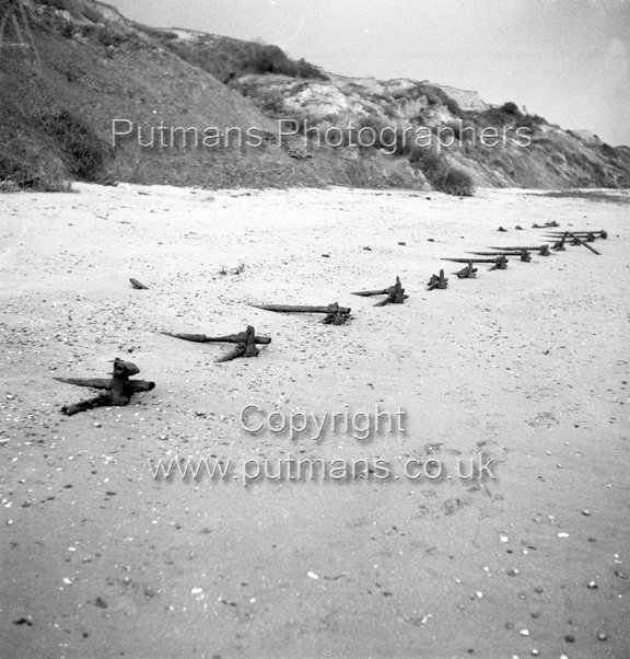 Ref 1975 Naze Cliff showing remains of anti-landing structure 1960