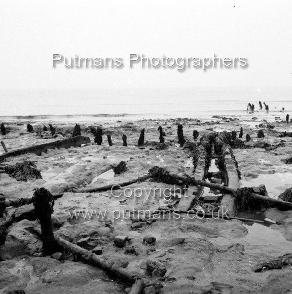 Ref 2006 Ancient wooden structure uncovered by sea at The Low 1963