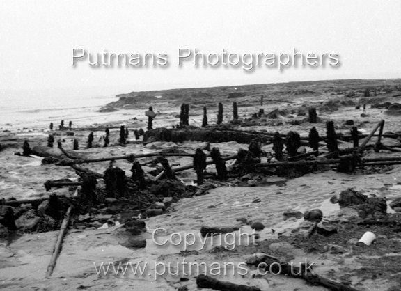 Ref 2017 Ancient wooden structure uncovered by sea at The Low 1963