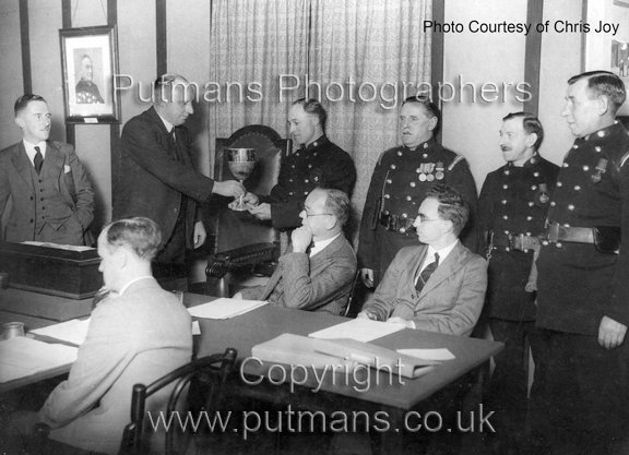 Ref OF 686 Presentation of award to fireman G C Jeffs