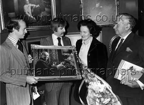 Pete Frost & David West of Putmans photographers presenting portrait of Rt Hon Julian Ridsdale MP to his wife Paddy