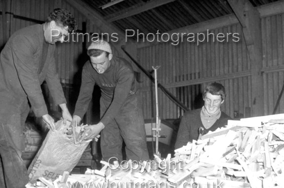 Lifeboat Crew cutting kindling