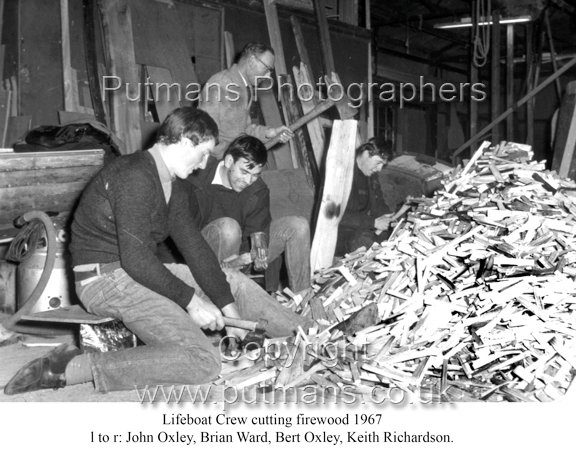 Lifeboat Crew cutting kindling
