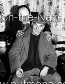 Parmenter Douglas behind unknown man 31-12-1962