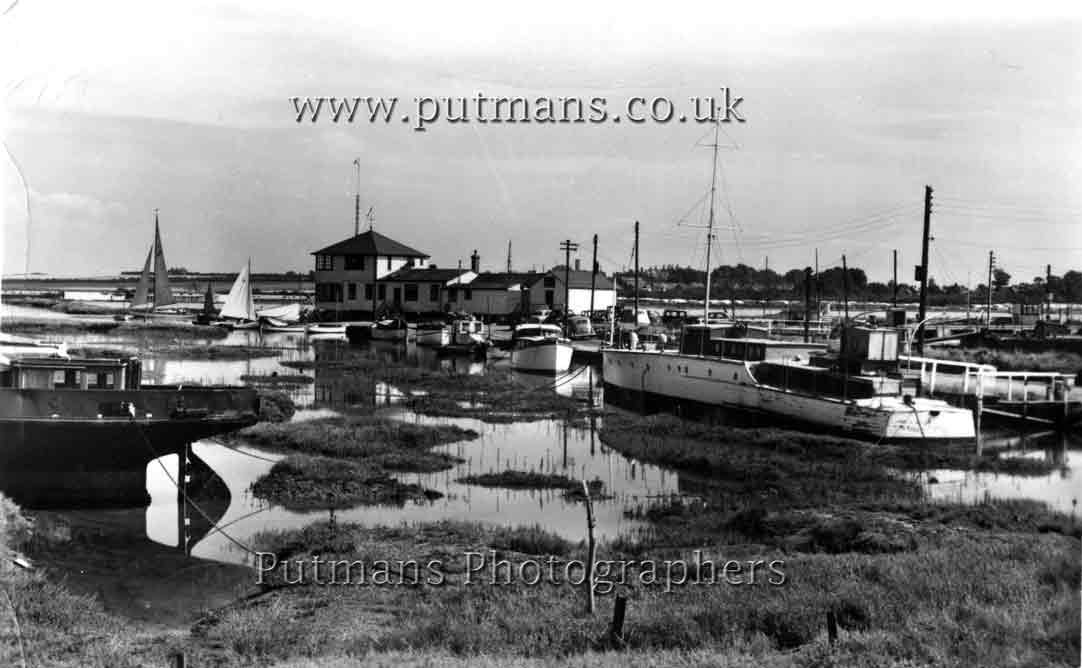 Ref 1497 The Yacht Club & Houseboat 'Maisie' in foreground