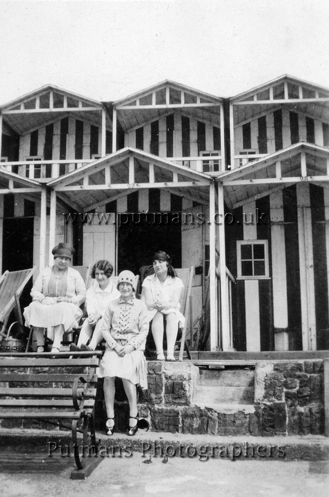 Ref 1078 Beach huts by Pier