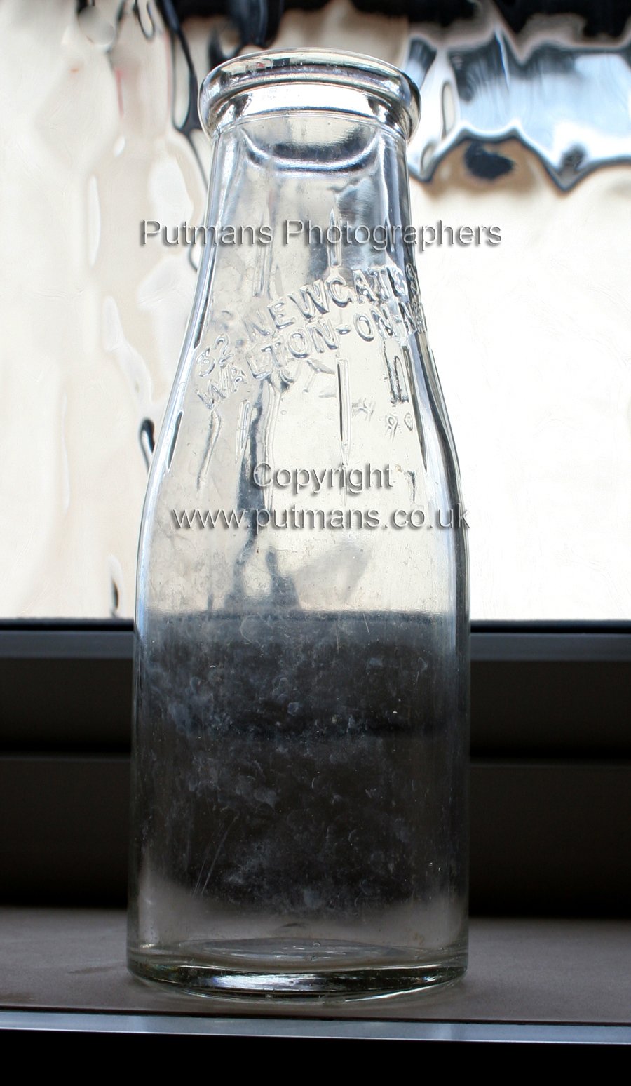 Ref 2866 Titchmarsh Milk bottle