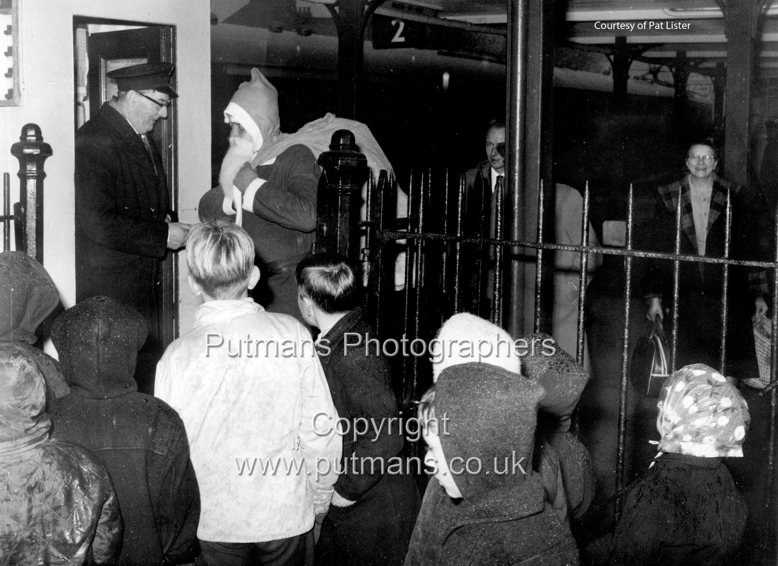 Ref 2967 Father Christmas arriving at the railway station