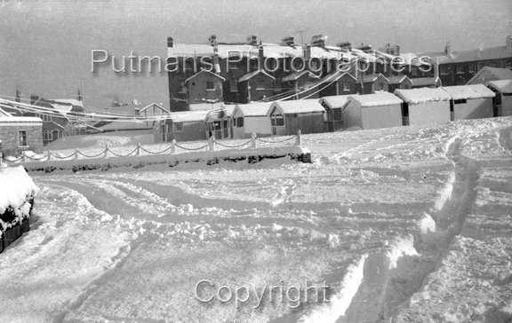 Ref 2522 Station Car Park with over-wintering beach huts. Snow 1958