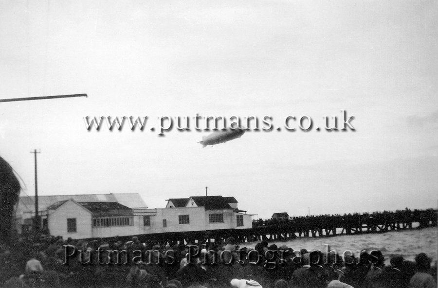 Ref 1186 Airship LZ127 Graf Zeppelin over pier 19th August 1931