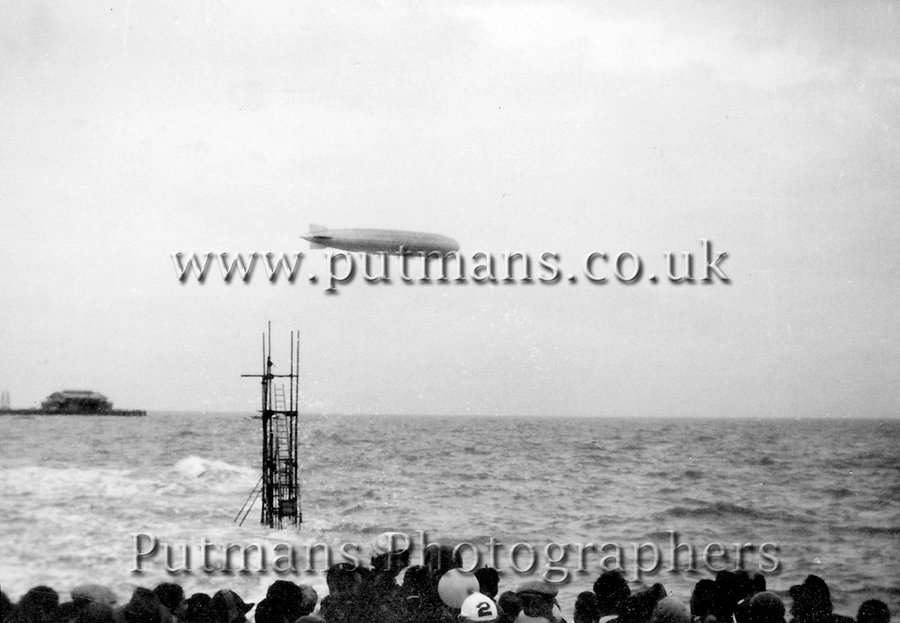 Ref 1187 Airship LZ127 Graf Zeppelin over pier 19th August 1931